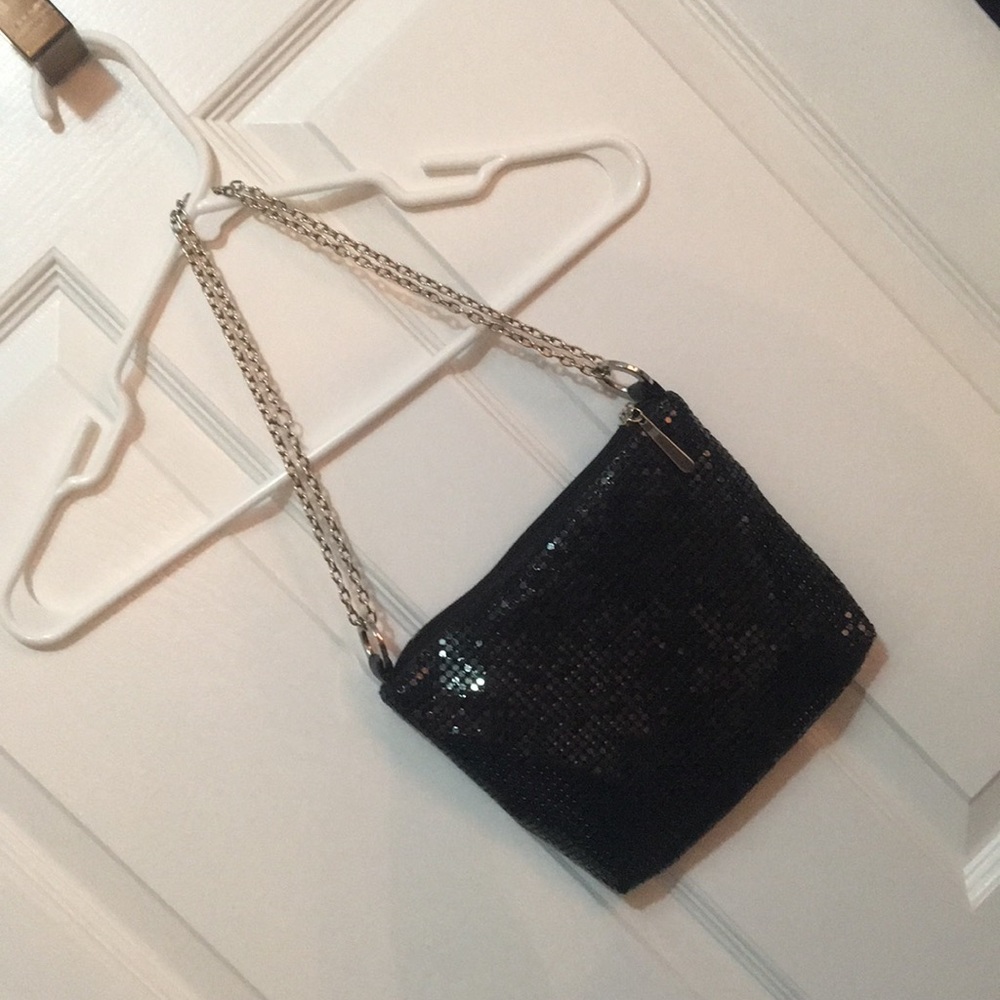 Woman’s black evening bag